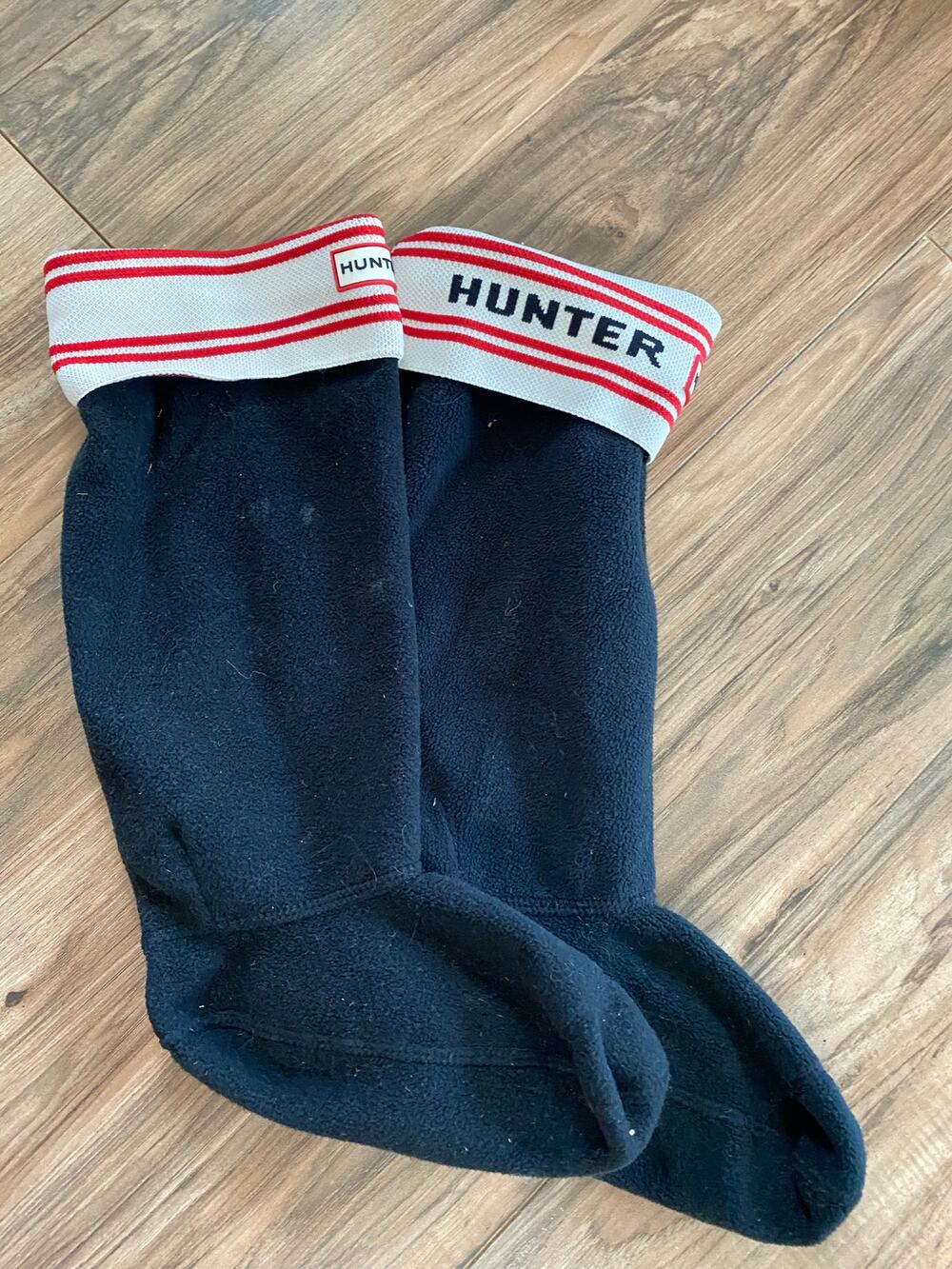 Navy Hunter tall fleece welly boot socks featuring fold-over white knit cuffs